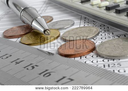 Financial background with money, calculator, table and pen.