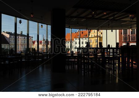 CITYSCAPE - Town hall square of a poviat town with a window