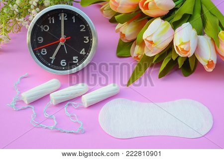 Sanitary napkins, pad (sanitary towel, sanitary pad, menstrual pad) on pink background.