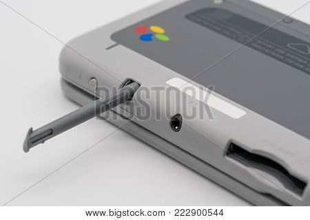 Bangkok, Thailand - Jan 18, 2018: Nintendo 3DS LL Stylus Super Famicom Edition. Portable game by Nintendo. Illustrative, editorial.
