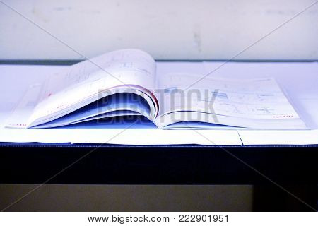 opened  book on the Table Study Material for all students