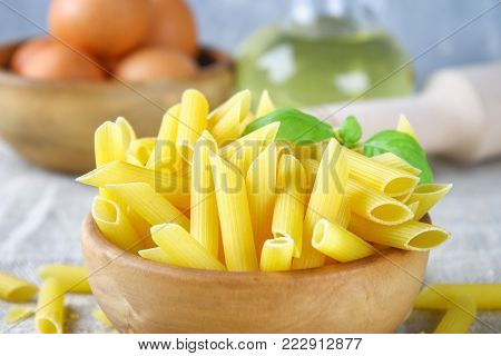 Penne rigate. Macaroni in the form of feathers. mostaccioli pasta