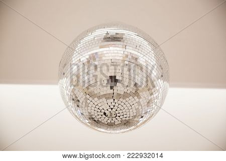 disco ball with reflective surface white backraund