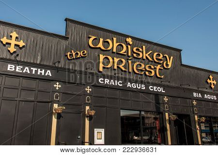 Boston USA 05.09.2017 Seaport - Whiskey priest bar cocktail drink pub on a sunny day