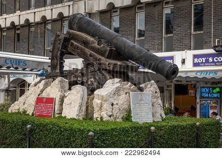 GIBRALTAR - DECEMBER 2017: monument made of old cannon located at Grand Casemates Square .