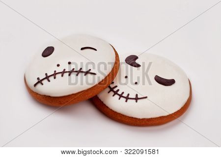 Jack Skellington Cookies On White Background. Traditional Halloween Desserts Recipe.