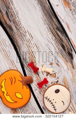 Halloween Holiday Background With Cookies. Halloween Gingerbread Cookies In A Shape Of Pumpkin And J