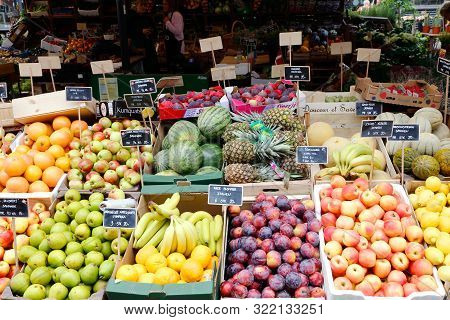 Copenhagen, Denmark - September 4, 2019: Fruit Market Stall With Bananas, Apples, Melonsm Pineapples