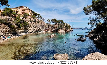 Picturesque Beach Calo De Ses Llises Lovely Cove Of Sand, Stone And Rocks In Peguera, Calvia, Mallor