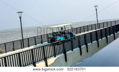 Sepang, Malaysia - September 7, 2019: Unidentified Worker Man Driving A Buggy Car At Avani Sepang Re