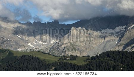 Alpine Landscape With Forest Ridge In Summer