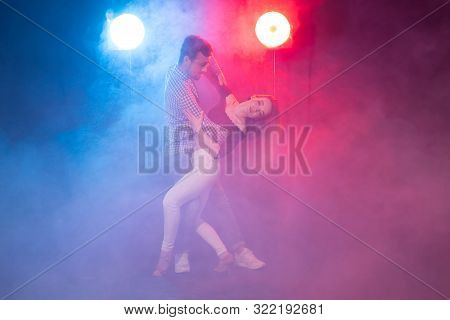 Social Dance, Kizomba, Salsa And Semba Concept - Young Beautiful Couple Dancing Bachata Or Salsa In 