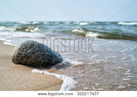 Stone On The Beach Of The Baltic Coast At Rewal In Poland