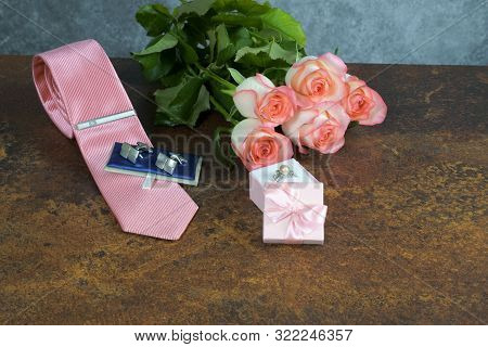 Roses On Rusty Table With Gray Background