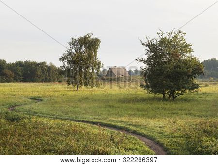 Vlaardingen, The Netherlands - September 2019 Winding Path Leading To A Reconstruction Of A Medieval