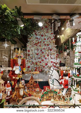 Heidelberg, Germany - August 7, 2019: Christmas Tree And Other Decorations And Articles Sells  Throu