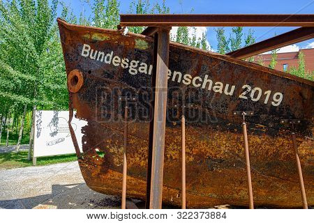 Heilbronn, Germany - August 8, 2019: Rusted Ship With The 2019 Federal Garden Show Buga Inscription 