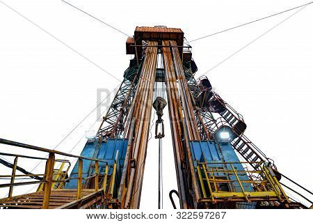 Oil And Gas Drilling Rig. Oil Platform Isolated On White Background. Drilling Rig In Oil Field For D