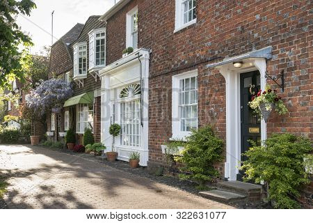 A Row Of Terraced Houses In An English Village