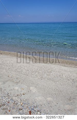 Chaniotis, Kassandra,  Greece - March 31, 2019: Beach Of Village Of Chaniotis At Kassandra Peninsula