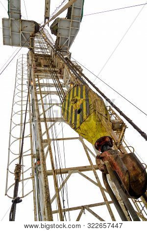 Oil And Gas Drilling Rig. Oil Platform Isolated On White Background. Drilling Rig In Oil Field For D