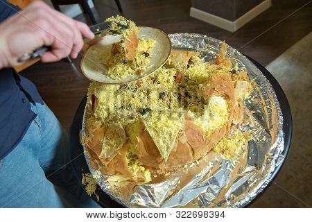 With A Spoonful Of Spice, Spoon The Customers With The Spoon. Rice Dish.shah Pilaf. Khan Pilaf In A 