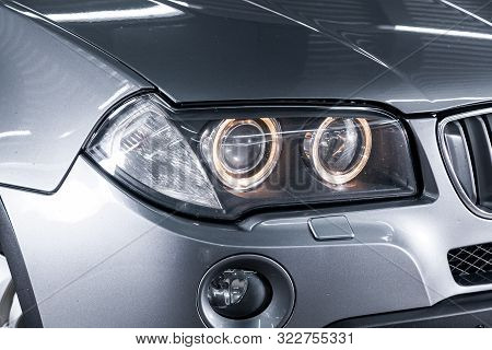 Novosibirsk, Russia - August 24, 2019:  Bmw X3, Car Headlights. Exterior Detail. Close Up Detail On 