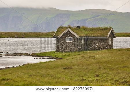 Traditional Faroe Stone House With Turf Roof In Kalsoy Island