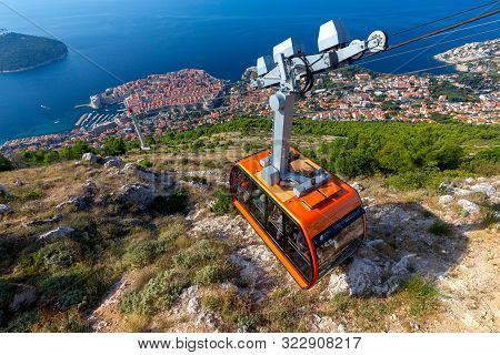 Aerial City View From The Mountains On A Sunny Morning. Cable Car. Dubrovnik. Croatia.