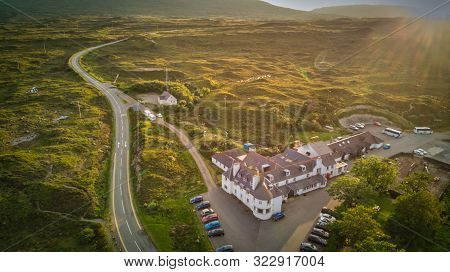 Sligachan Hotel And Parked Cars Around, Standing On The Road In Glen Sligachan, Isle Of Skye, Aerial