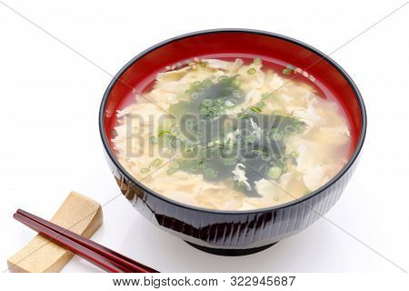 Japanese Foof, Kakitama Egg Soup In A Wooden Bowl On White Background