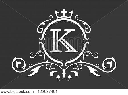 Stylized Letter K Of The Latin Alphabet. Monogram Template With Ornament And Crown For Design Of Ial