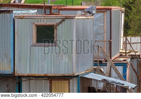 Residential Cabins (a Place For Temporary Residence) Of Builders. They Stand On Top Of Each Other. M
