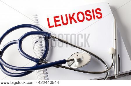 Notebook With Text Leukosis With Pen And Stethoscope, Medicina