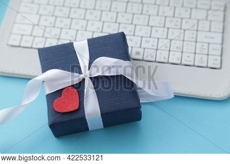 Computer Keyboard And Gift Box Dark Blue Color, Heart On Light Blue Background. Gift For Men. Father