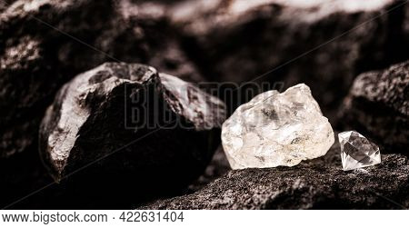 Rough Diamond Next To A Cut Diamond, In A Coal Mine, Concept Of Mining And Mineral Extraction