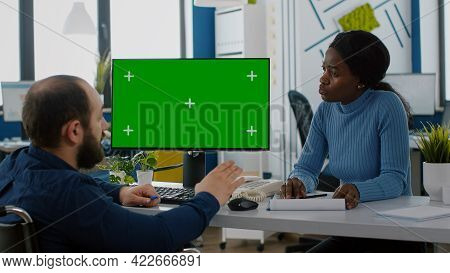 Handicapped Paralysed Entretreneur Explaning To Black Employee Financial Evolution Of Company Pointi