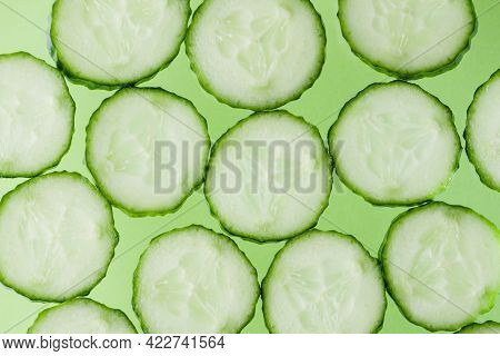 Background With Cucumbers. Close Up Of Fresh Cucumber Slices Top View Texture Background. Fresh Cucu