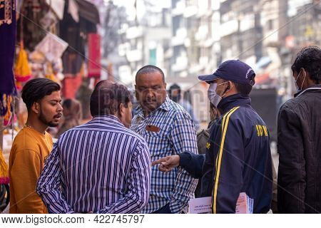 Haridwar, Uttarakhand India April 06, 2021. Policemen Spreading Awareness Of Protection From Coronav