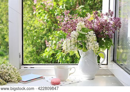 Home Interior With Decor Elements, Beautiful Spring Lilac Branches In A Vase On A Sunny Window, Abst