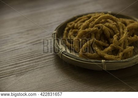 Murukku Is A Savory, Crunchy Snack Originating From The Indian Subcontinent.its An Indian Traditiona
