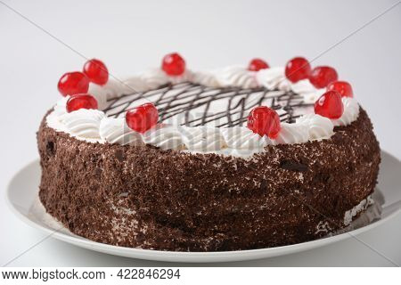 Black Forest Cake, Schwarzwald Pie, Dark Chocolate And Cherry Dessert On A White Background. Black F