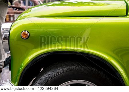 Retro Car Festival. Retro Car Headlight. Fragment Of The Front Of A Retro Car. The Old Car Has Been 