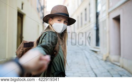 Portrait Of Young Woman Traveler Walking In City On Holiday And Looking At Camera, Coronavirus Conce