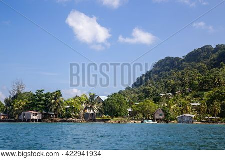 Chea Village, Solomon Islands - May 31, 2015: Houses Along The Coastline In A Village On The Solomon