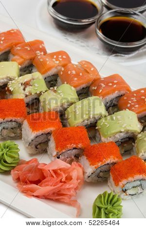 Roll Philadelphia, Unagi roll Uramaki, roll with flying fish roe with soy sauce. 