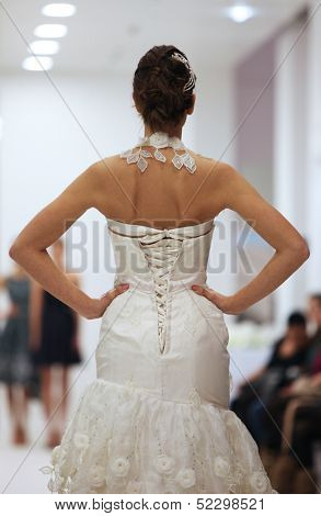 ZAGREB, CROATIA - OCTOBER 12: Fashion model in wedding dress made by Lorien on 'Wedding Expo' show in the Westgate Shopping City in Zagreb, Croatia on October 12, 2013