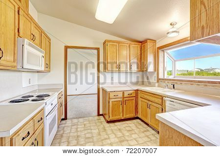 Countryside House Interior. Kitchen Room With Vaulted Ceilign And Skylight