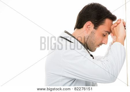 doctor leaning to the wall