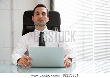 businessman with eyes closed